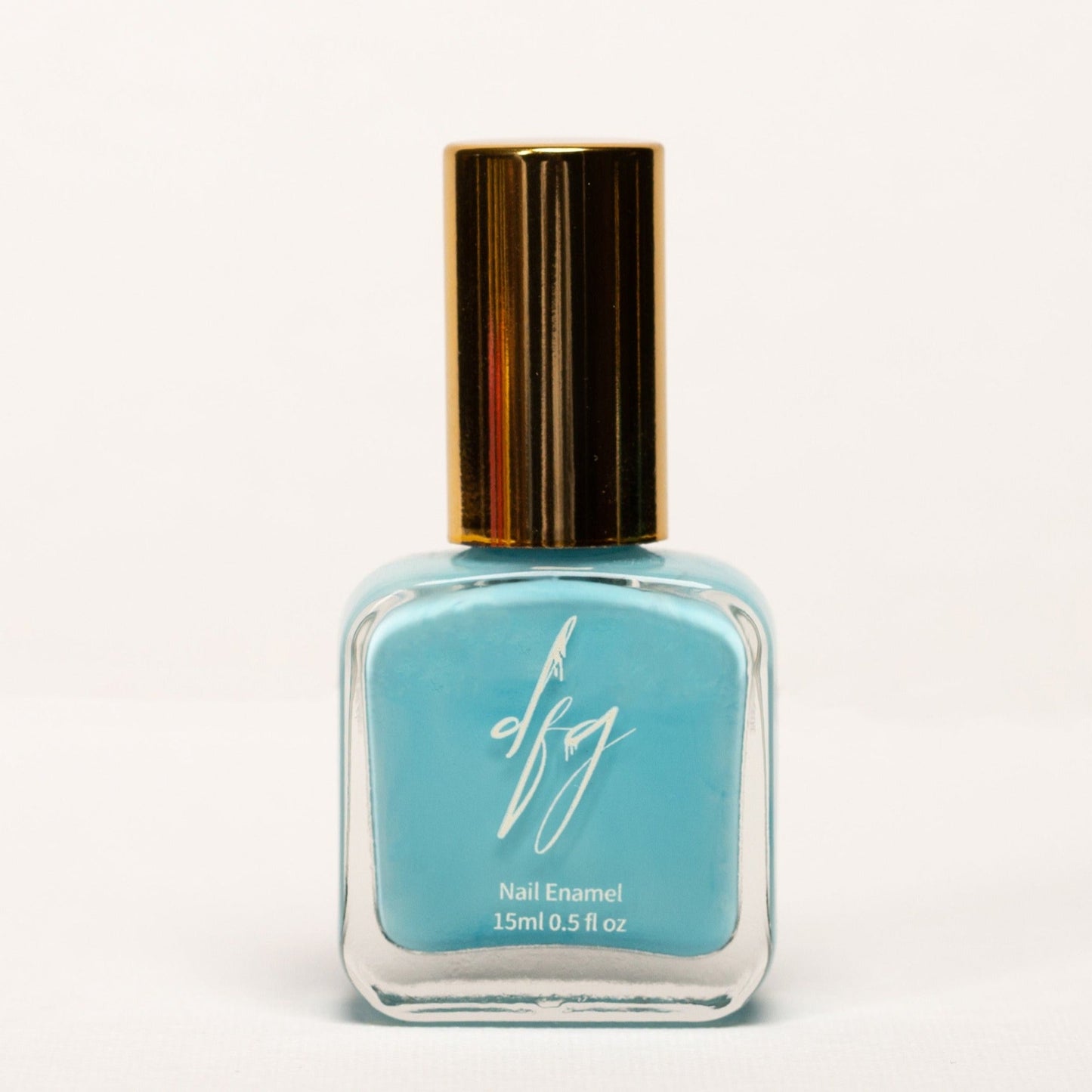 In this photo, we showcase a bottle of light blue nail polish, designed to be inclusive and accessible for all individuals. The nail polish bottle is sleek and modern, with a smooth texture that can be easily identified by touch. The color of the nail polish is a soft and delicate light blue, reminiscent of clear skies and tranquility.