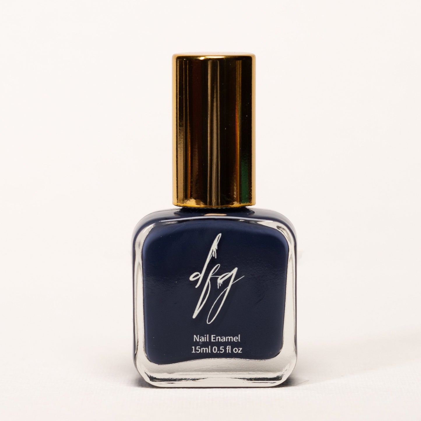 In this captivating photo, we showcase a bottle of blue nail polish that celebrates inclusivity and accessibility. The nail polish bottle boasts an elegant design, featuring a smooth texture for easy identification by touch. The color of the nail polish is a stunning and serene shade of blue, reminiscent of tranquil waters and soothing calm.