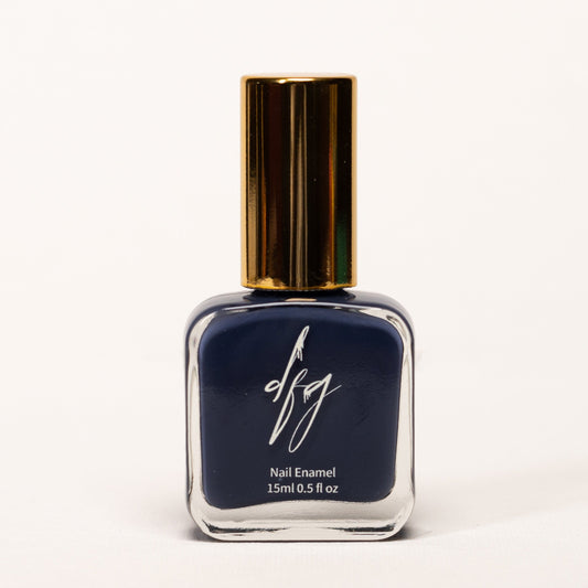 In this captivating photo, we showcase a bottle of blue nail polish that celebrates inclusivity and accessibility. The nail polish bottle boasts an elegant design, featuring a smooth texture for easy identification by touch. The color of the nail polish is a stunning and serene shade of blue, reminiscent of tranquil waters and soothing calm.